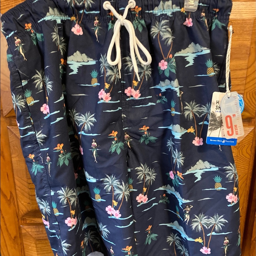 Men’s lined swim trunks with hula girls size M